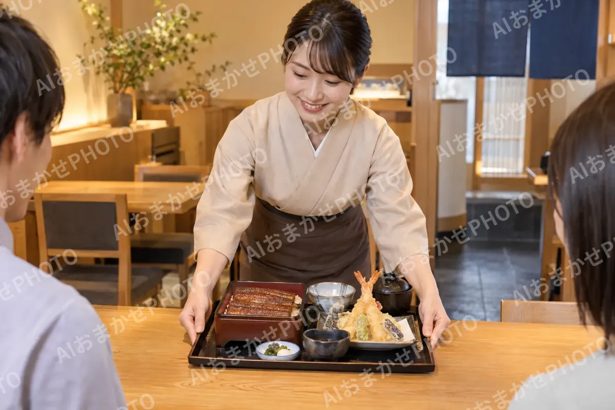 天ぷらとうなぎのお膳を出す店員（天ぷら・うなぎの写真 No.27）