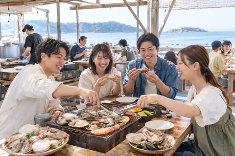 海辺の浜焼き店でにぎわうお客様たち（浜焼きの写真 No.24）